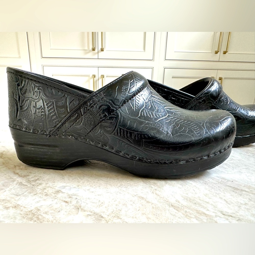 Dansko Professional black tooled leather clogs